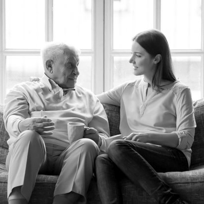 woman and elder man talking